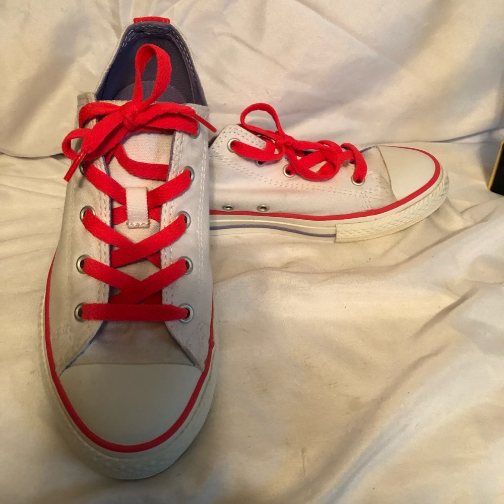 Converse. size 4 kids 6.5 woman’s light purple/ bright orange .